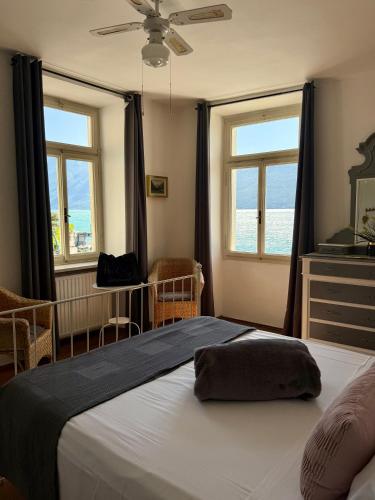 Ein Bett oder Betten in einem Zimmer der Unterkunft Albergo Gargnano