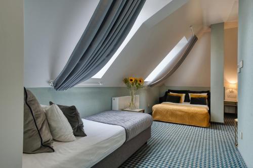 Hotel Villa Art Novis City Centerにあるベッド