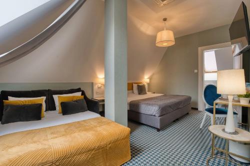 Hotel Villa Art Novis City Centerにあるベッド