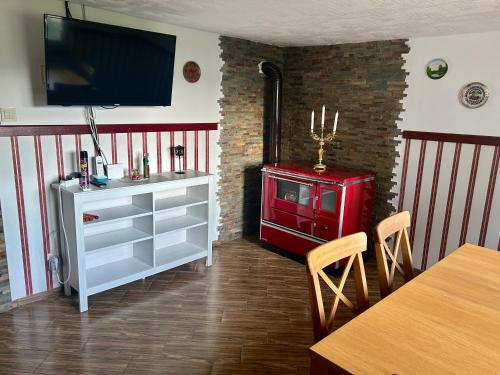 Μια τηλεόραση ή/και κέντρο ψυχαγωγίας στο Andante apartments