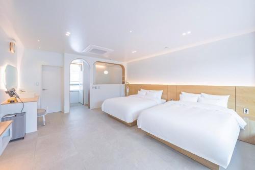 Postel nebo postele na pokoji v ubytování Chuncheon Wolhadam Pool Villa