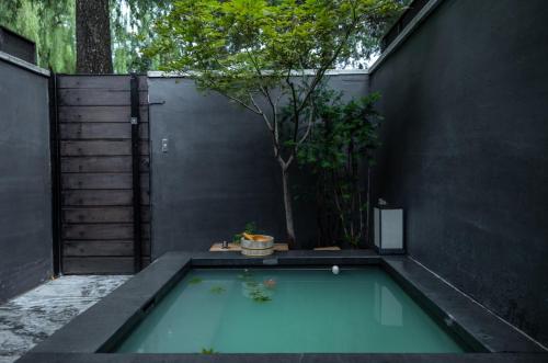 Kolam renang di atau dekat dengan 北京小汤一瓢私汤度假酒店 Beijing XiaoTang YiPiao Hot Spring Resort