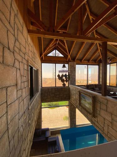 Bazén v ubytování منتجع كفريا السياحي-عجلون Kufraya Resort-Ajloun nebo v jeho okolí