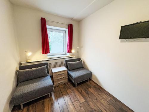 Televisyen dan/atau pusat hiburan di Apartment Mentenwirt by Interhome