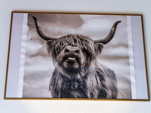 a picture of a cow with long horns at Apartment Mon Abri by Interhome in Les Diablerets