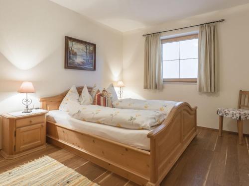 Ένα ή περισσότερα κρεβάτια σε δωμάτιο στο Apartment Lodron by Interhome