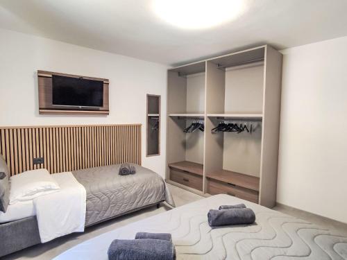 Ένα ή περισσότερα κρεβάτια σε δωμάτιο στο Apartment Rosa Blu by Interhome