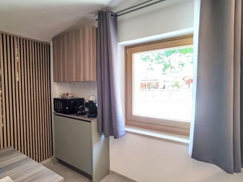 Η κουζίνα ή μικρή κουζίνα στο Apartment Rosa Blu by Interhome