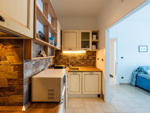 Η κουζίνα ή μικρή κουζίνα στο Apartment Maura by Interhome