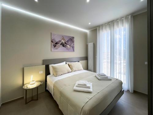 Postel nebo postele na pokoji v ubytování Settimo Cielo al Massimo Guest House