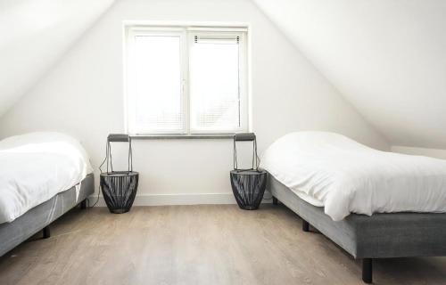 Ένα ή περισσότερα κρεβάτια σε δωμάτιο στο K Landhuis Bouwlust