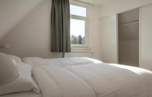 Giường trong phòng chung tại E -09 Bouwlust