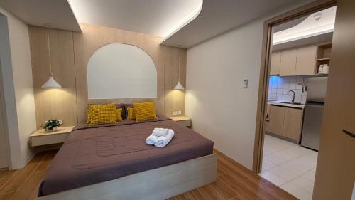 Ένα ή περισσότερα κρεβάτια σε δωμάτιο στο Fantasea Kamala 1 BR Apartments Near Beach 212