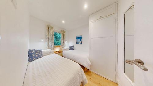 En eller flere senge i et værelse på St Ives Kornel Hewel 2 Bedrooms