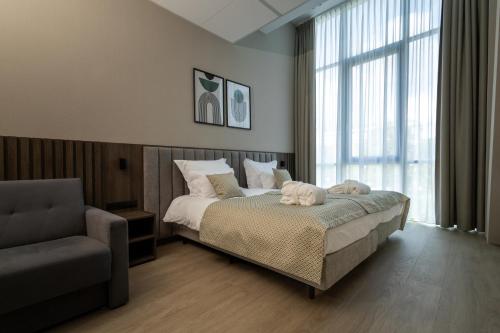 Ένα ή περισσότερα κρεβάτια σε δωμάτιο στο Hotel Centrum Business
