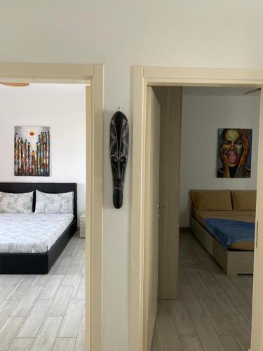 Ένα ή περισσότερα κρεβάτια σε δωμάτιο στο SGC Boa Vista Apartments