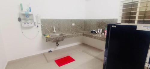 Koupelna v ubytování Siva Sakthi Das Brindhavanam