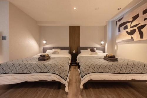 Hotel Numero dixにあるベッド