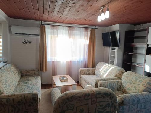 Zona de estar de Derű Apartman