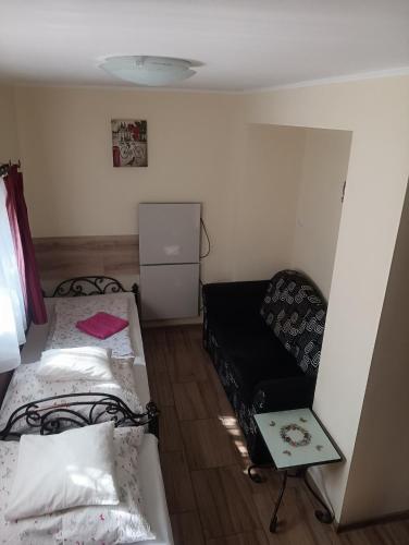 Cama o camas de una habitación en Derű Apartman