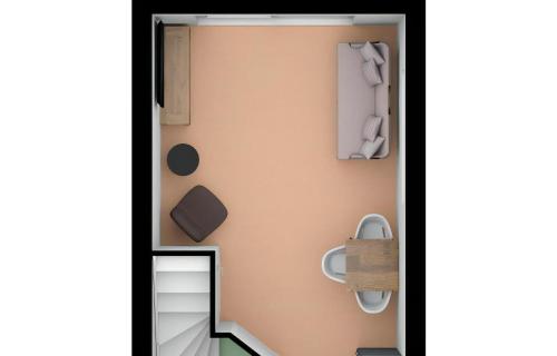 a small bathroom with a toilet in a room at D-8B Van Der Linde in De Cocksdorp