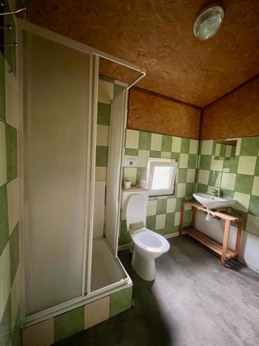 Ein Badezimmer in der Unterkunft SŁOŃCE MAZUR
