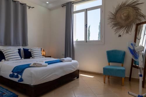 Villa TAYLAMにあるベッド