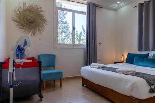 Villa TAYLAMにあるベッド