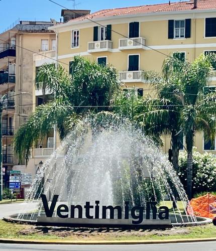 a water fountain in front of a building at Casa di Bea in Ventimiglia