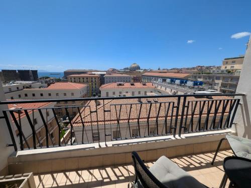 a balcony with a view of a city at Incoming Municipio in Naples