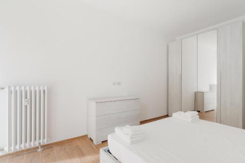 Postel nebo postele na pokoji v ubytování GuestHost - Bright & Comfy Apartment in Corvetto