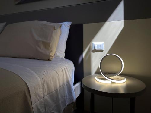 Postel nebo postele na pokoji v ubytování Settimo Cielo al Massimo Guest House
