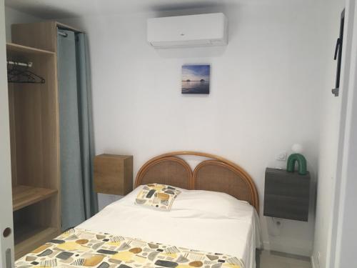 Ένα ή περισσότερα κρεβάτια σε δωμάτιο στο Location charmante Bassin d'Arcachon La Teste de Buch , Gironde , France