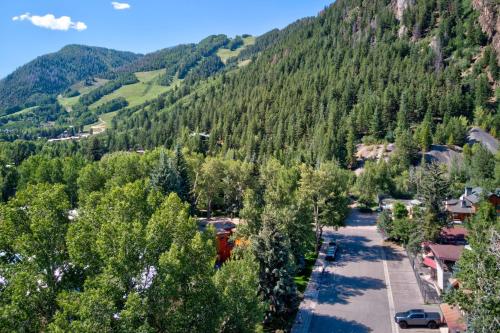 an aerial view of a village in the mountains at Aspen Hideaway by AvantStay Walk to Aspen Near Slopes Pool Hot Tub Access in Aspen