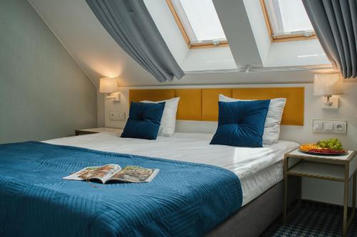 Hotel Villa Art Novis City Centerにあるベッド