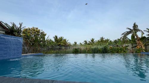 Der Swimmingpool an oder in der Nähe von Wind Haven Yala