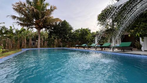 Der Swimmingpool an oder in der Nähe von Wind Haven Yala