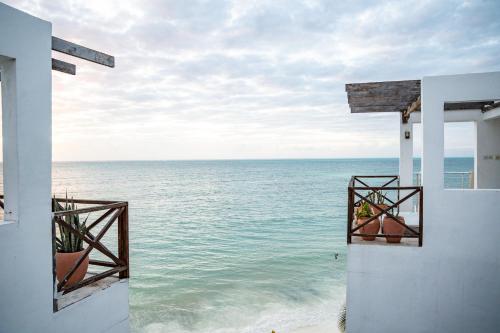 a view of the ocean from a building at ZAN Tropical Island in Bwejuu
