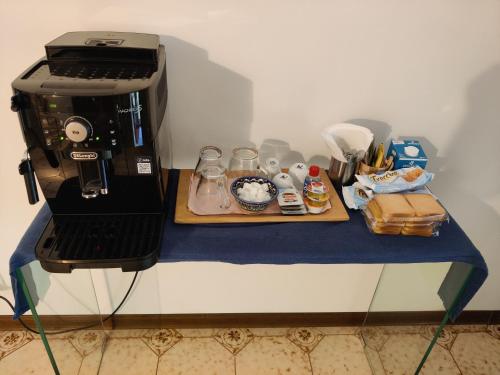 a coffee maker sitting on top of a table at Villa alle Querce in Martellago