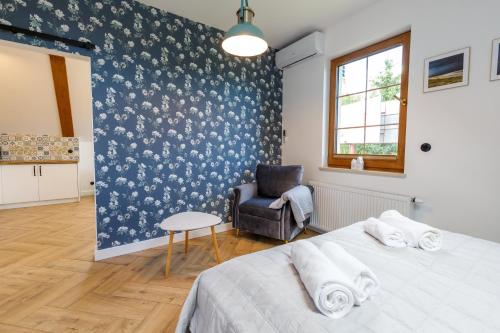 En eller flere senge i et værelse på Green Door