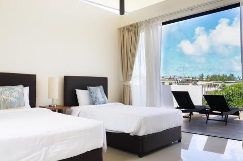 Ένα ή περισσότερα κρεβάτια σε δωμάτιο στο Welcoming 3bdr Townhouse Laguna Park