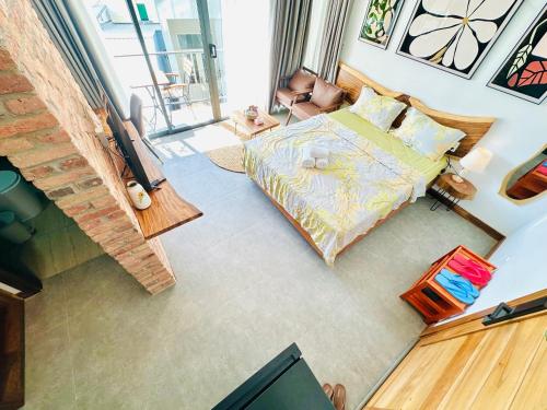 an overhead view of a bedroom with a bed at 308MSNK Maison Luxe Studio l Balcony & Kitchen in Can Tho