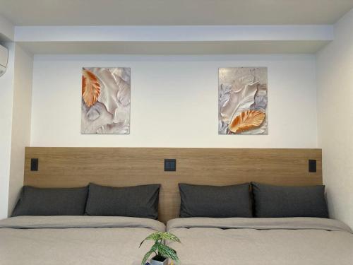 Postel nebo postele na pokoji v ubytování Akatsuki Iriya Hotel