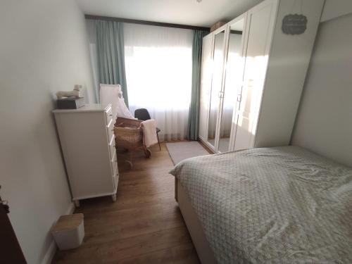 Postel nebo postele na pokoji v ubytování Apartament Vis Ramiro