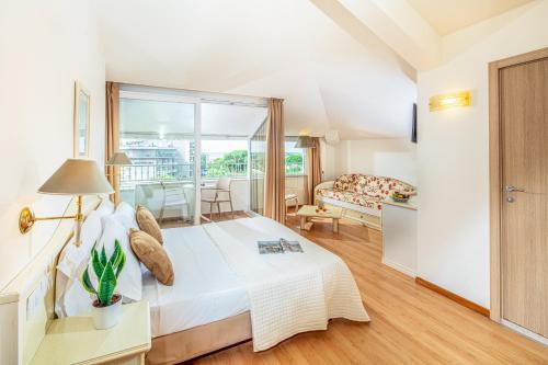 Φωτογραφία από το άλμπουμ του Hotel Jasminum σε Μπιμπιόνε