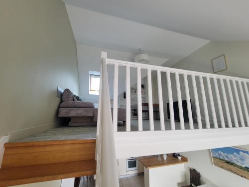 En eller flere senge i et værelse på Duplex Port de Lesconil