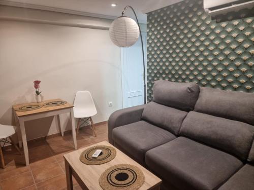 Ein Sitzbereich in der Unterkunft Alojamiento con vistas al mar en Puerto Sagunto