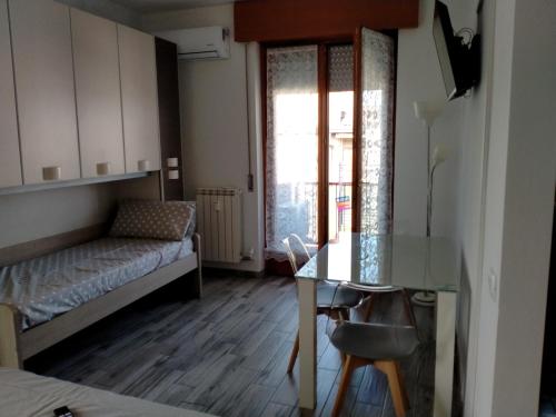 Una cama o camas en una habitación de Monolocale