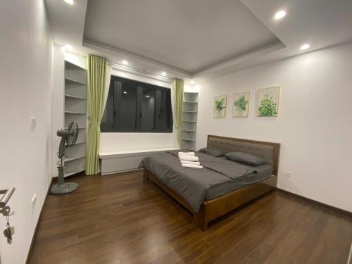 Кровать или кровати в номере Rose house