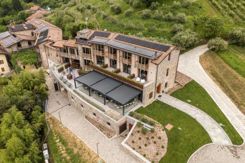 an aerial view of an estate with a large building at Borgo Capietaglio Wine Resort in Gromlongo